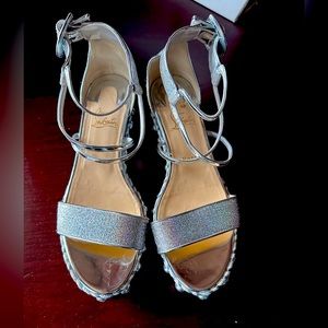 Christian Louboutin
Chocazeppa Embellished Metallic Wedge Sandals